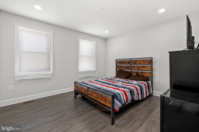 bedroom featuring dark hardwood / wood-style floors