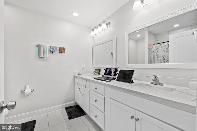 bathroom featuring vanity and a shower with curtain