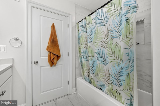 bathroom featuring vanity and shower / tub combo