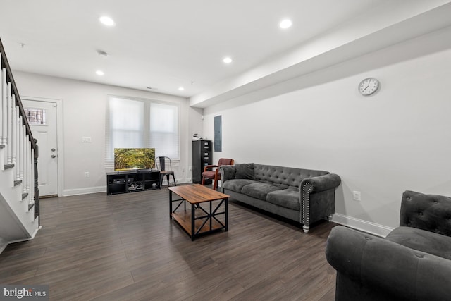 living room featuring dark hardwood / wood-style floors