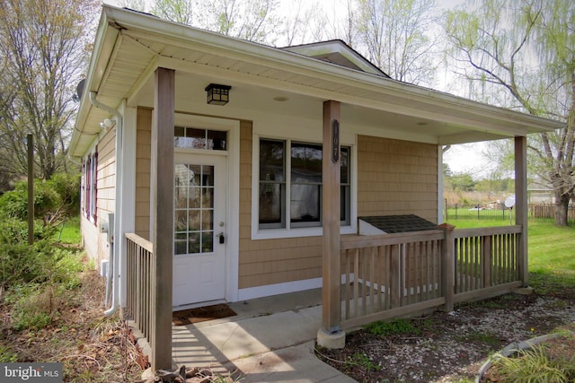 property entrance with a porch