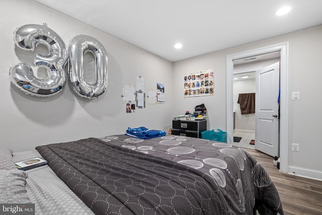 bedroom featuring dark wood-type flooring