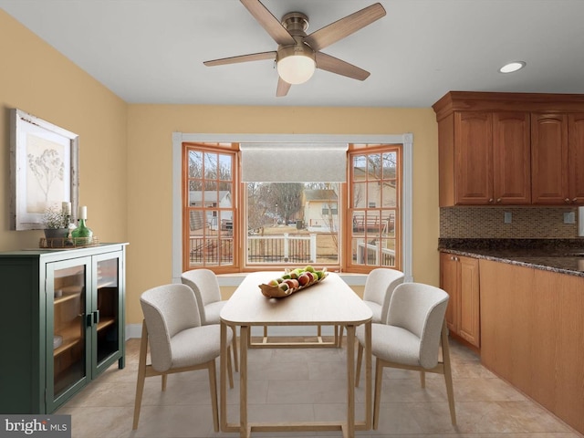 dining space featuring a ceiling fan and recessed lighting