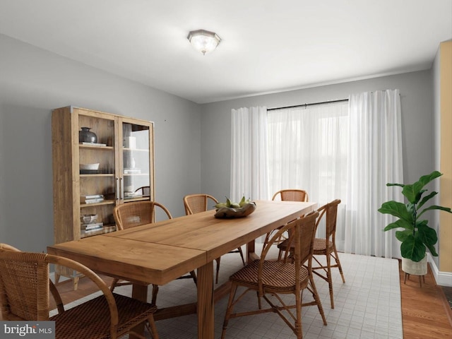 dining space with light wood-style flooring