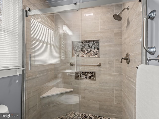 bathroom featuring a stall shower