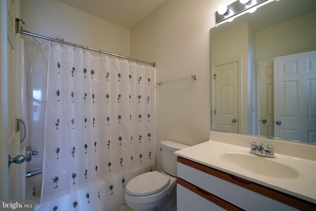 full bathroom with shower / bath combination with curtain, toilet, and vanity