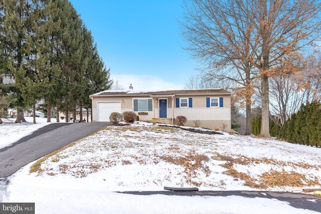 single story home with a garage