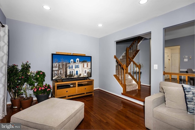 living room featuring dark wood-type flooring