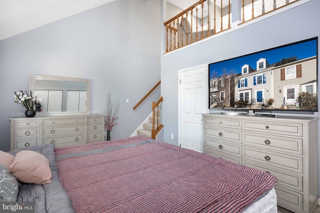 bedroom with a high ceiling