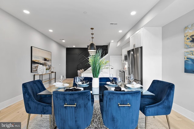 dining area featuring light hardwood / wood-style flooring