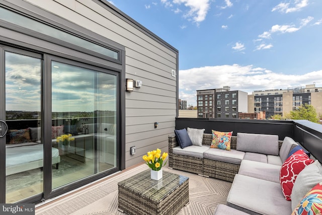 balcony featuring an outdoor living space