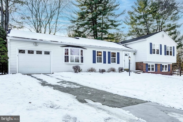 split level home featuring a garage