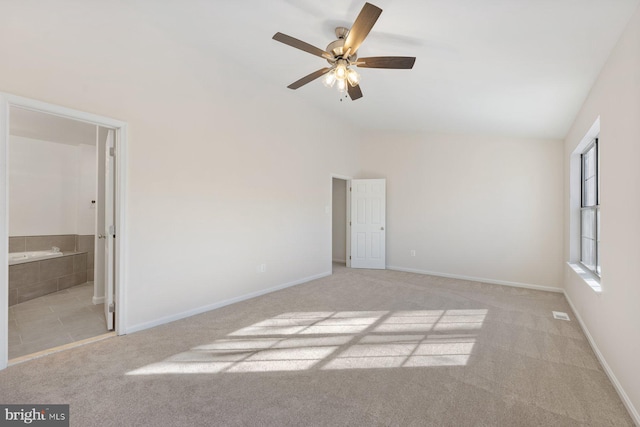 carpeted empty room with ceiling fan