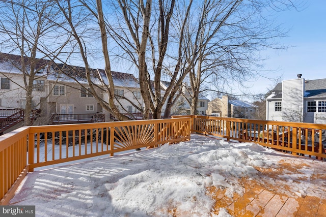 view of snow covered deck