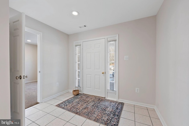 view of tiled foyer entrance