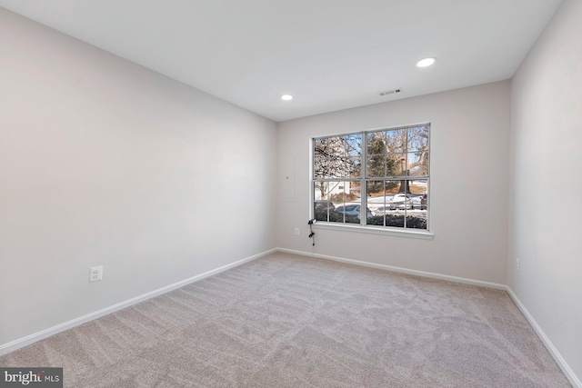 view of carpeted spare room