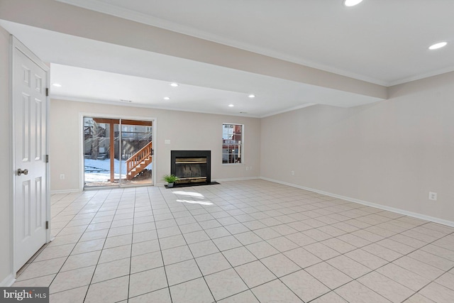 unfurnished living room with crown molding and a healthy amount of sunlight