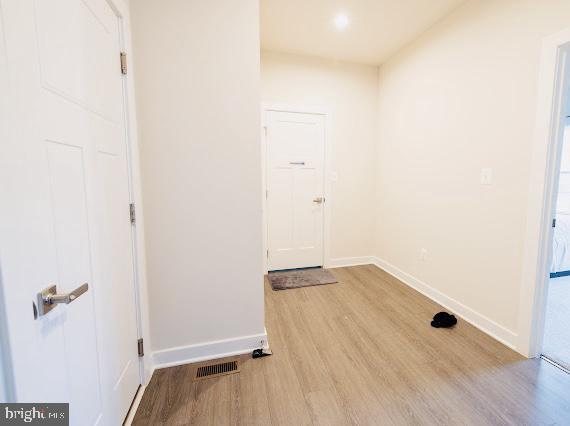 interior space with light hardwood / wood-style flooring