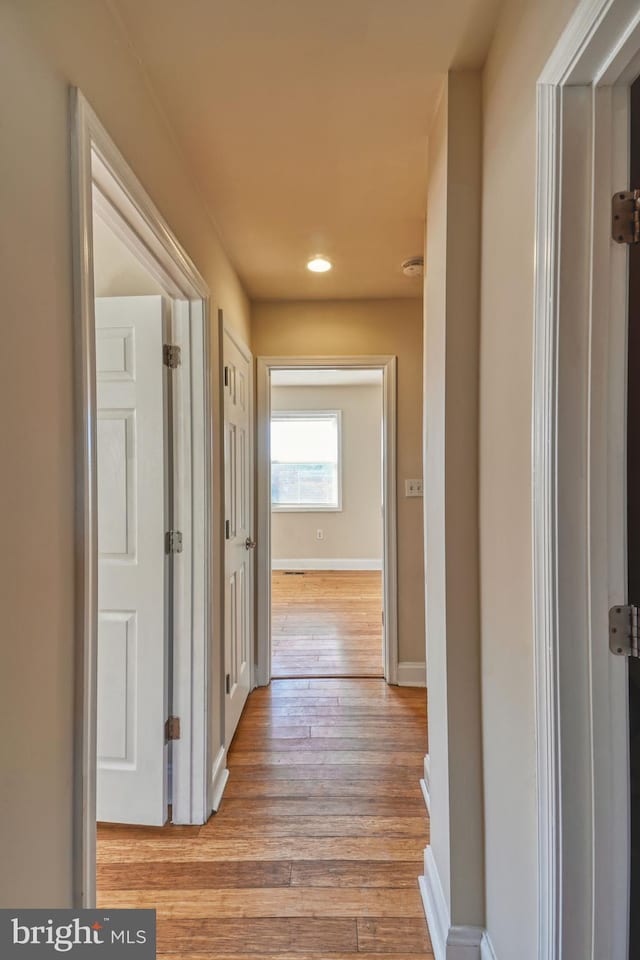 hallway featuring light hardwood / wood-style floors