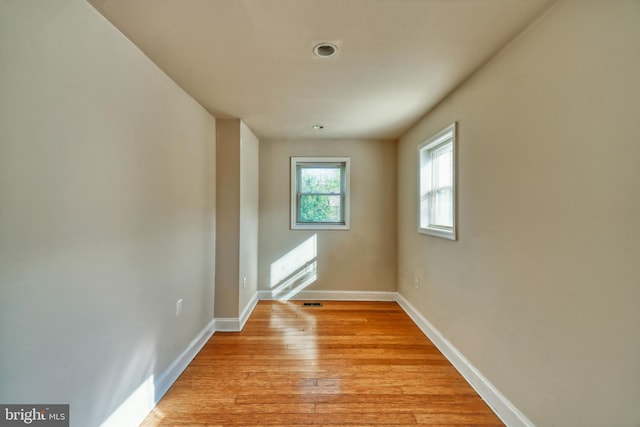 unfurnished room featuring light hardwood / wood-style flooring