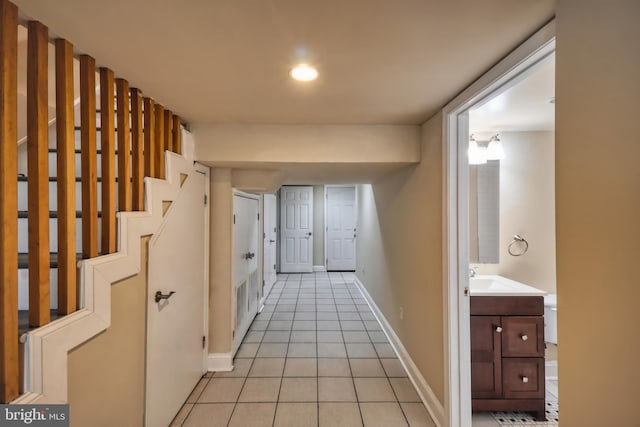 hallway with light tile patterned floors