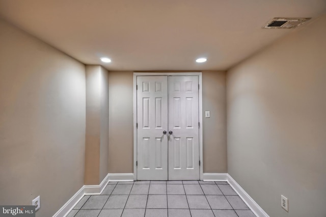 entryway featuring light tile patterned flooring