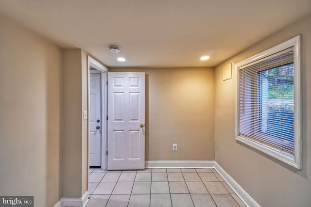 interior space with light tile patterned floors