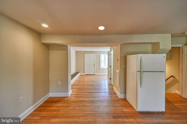 kitchen featuring white refrigerator and light wood-type flooring