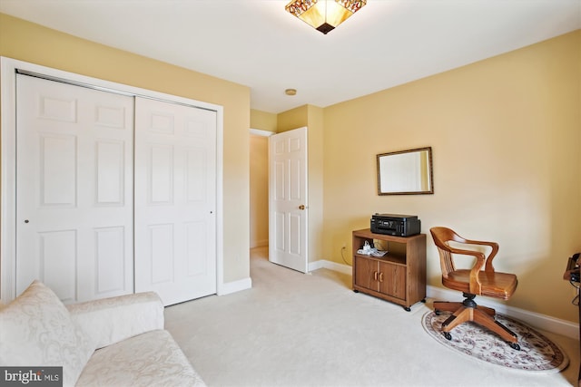 living area with light carpet