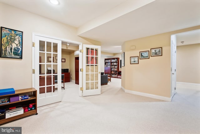 interior space featuring light colored carpet and french doors