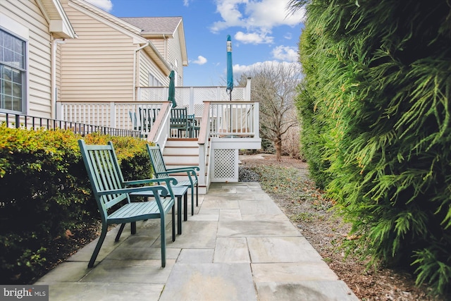 view of patio / terrace featuring a wooden deck