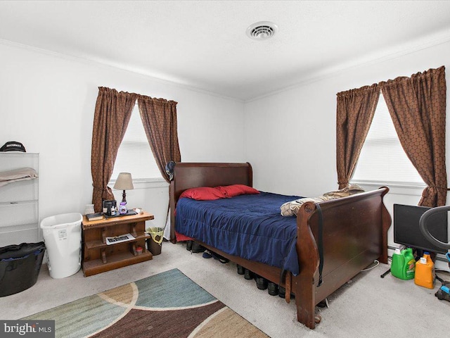 carpeted bedroom featuring a baseboard radiator