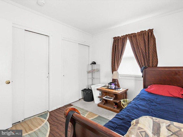 bedroom featuring carpet and ornamental molding