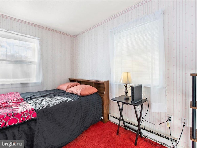 bedroom with carpet flooring and baseboard heating