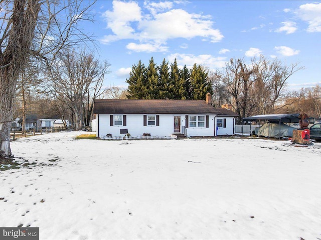 view of front of house with a carport