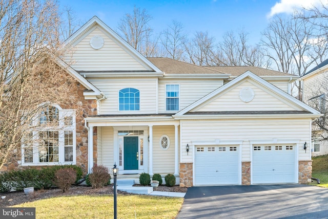 view of front property with a garage