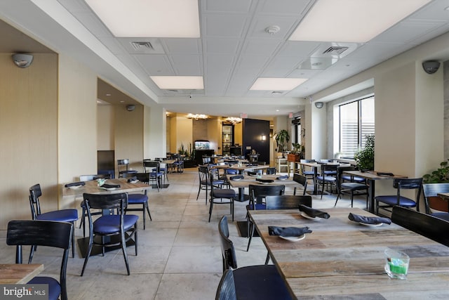 dining area with light tile patterned floors