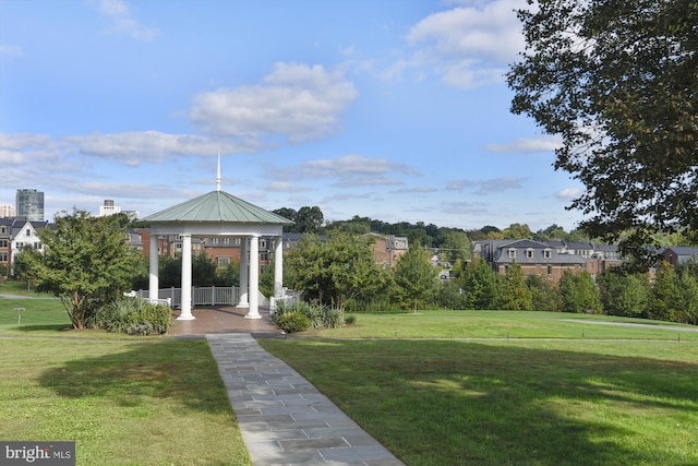 surrounding community featuring a yard and a gazebo