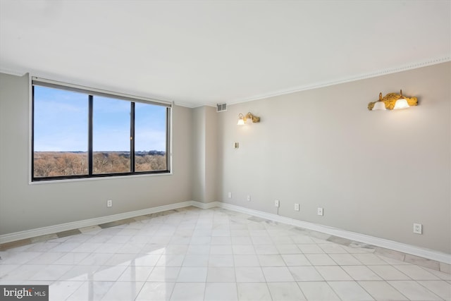 empty room with light tile patterned floors