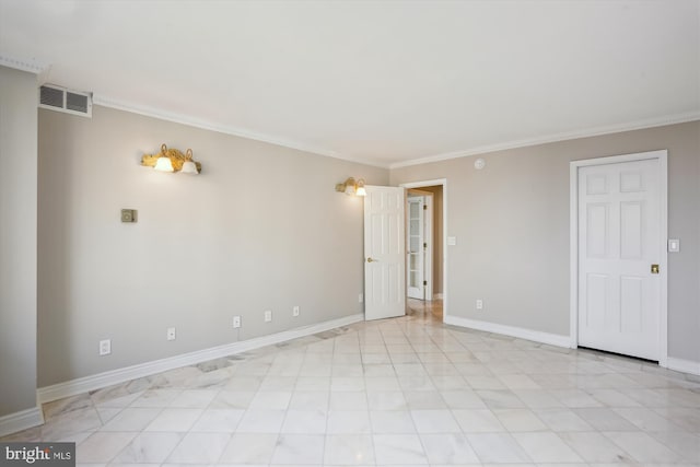 unfurnished room featuring crown molding