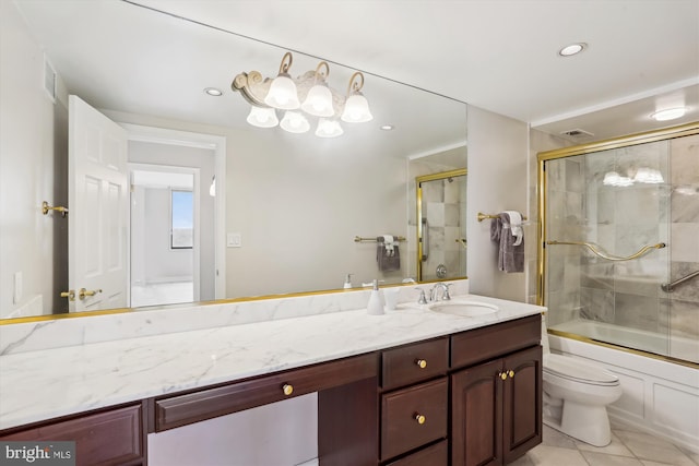 full bathroom with shower / bath combination with glass door, vanity, toilet, and tile patterned flooring