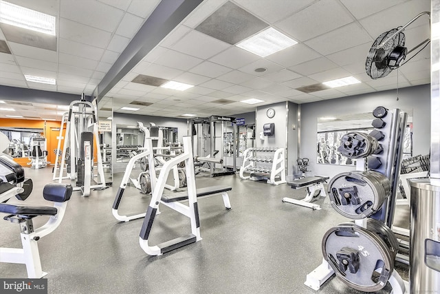 gym featuring a drop ceiling