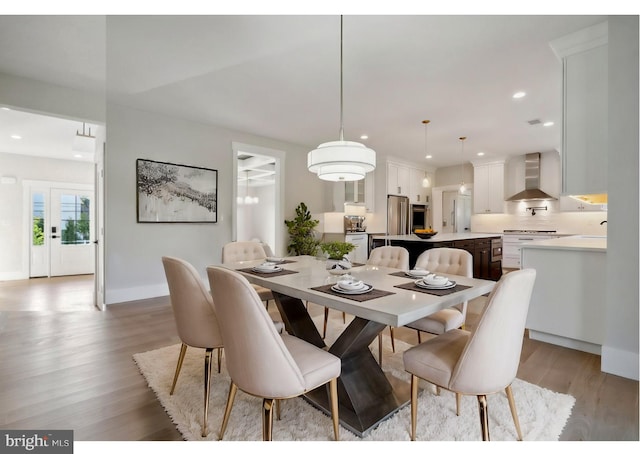 dining room featuring light hardwood / wood-style flooring