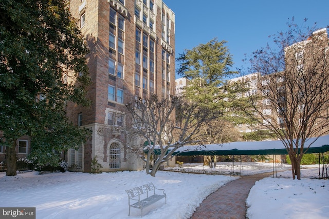 view of snow covered property