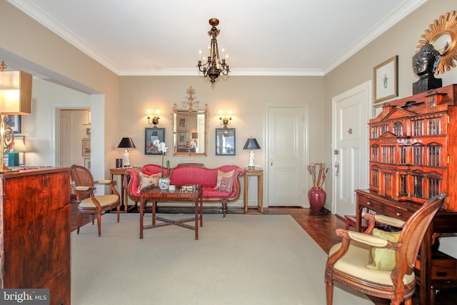 living area with crown molding and a notable chandelier