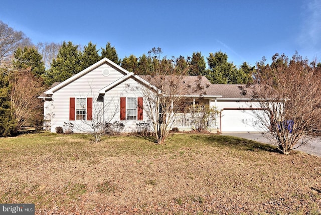 single story home featuring a garage and a front lawn