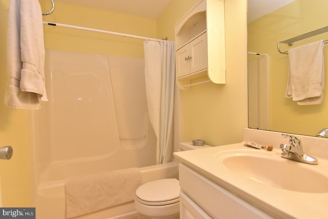 full bathroom featuring vanity, toilet, and shower / bathtub combination with curtain