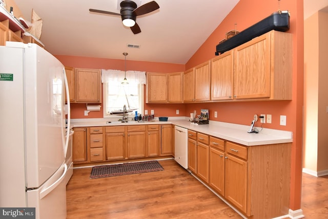 kitchen featuring white appliances, ceiling fan, sink, decorative light fixtures, and light hardwood / wood-style floors