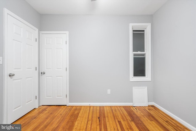 unfurnished room featuring light hardwood / wood-style flooring