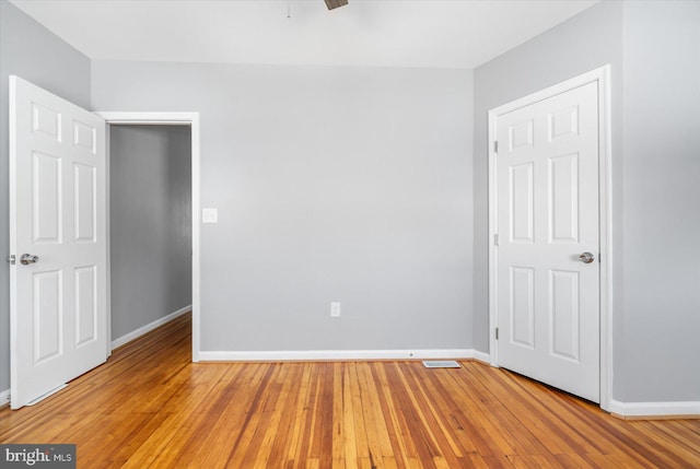 unfurnished bedroom with light hardwood / wood-style flooring